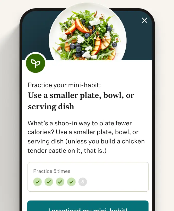 Develop healthy habits Noom app showing healthy eating tips and a salad
